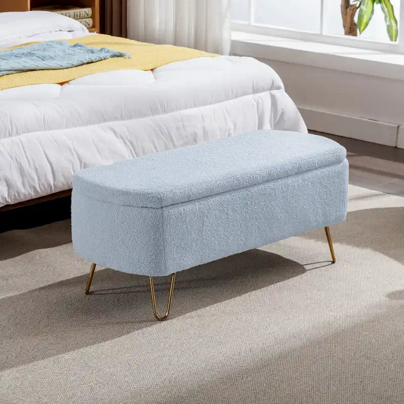 Banc pouf de rangement bleu avec pieds dorés