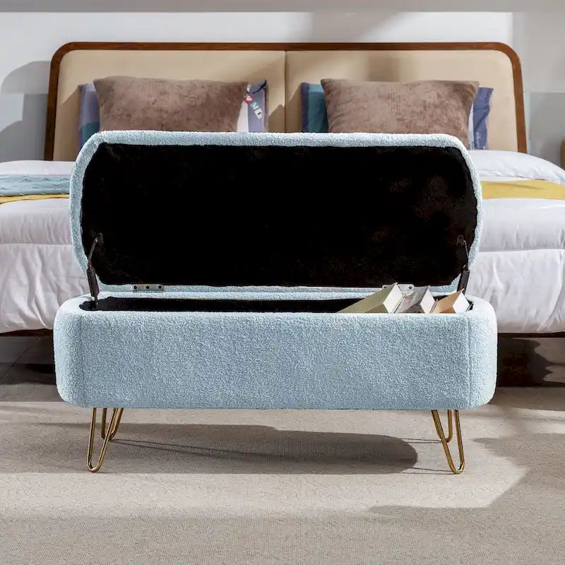 Banc pouf de rangement bleu avec pieds dorés