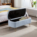 Banc pouf de rangement bleu avec pieds dorés